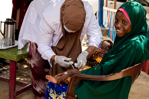 A child receives routine immunizations in Mogadishu, Somalia, August 2023. Photo credit: WHO/I. Taxta