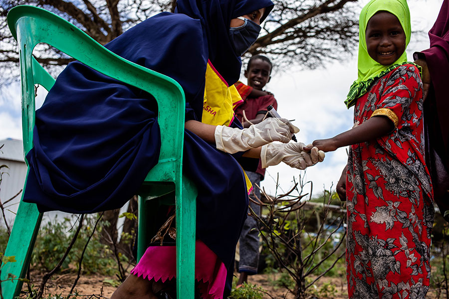 A child is vaccinated as part of national polio and measles vaccination campaign in Mogadishu, Somalia in September 2020.