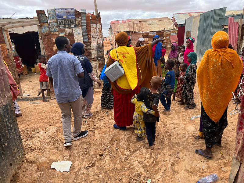 Sarbina Ali, a community health worker visits on average 50 households in the IDP camp to raise awareness about the importance of hygiene and refer patients to available health services including immunization. Photo credit: WHO Somalia/I. Taxta