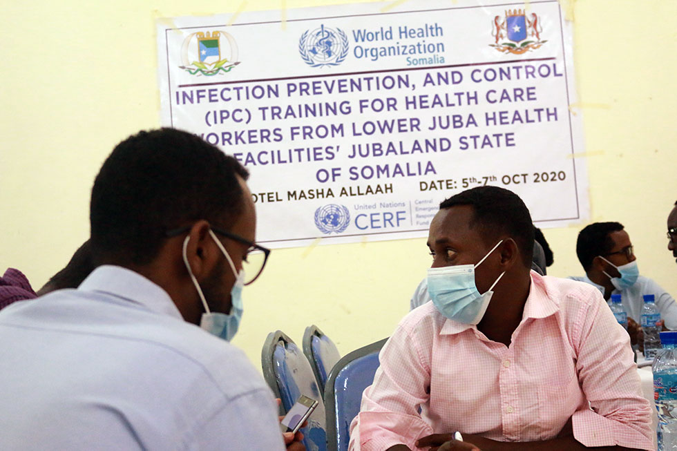 Health workers gaining skills at a training in infection prevention and control, in Jubaland State