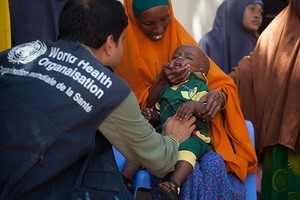 Child_receives_vaccination_to_protect_against_common_childhood_diseases