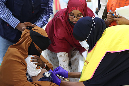 Skilled health workers vaccinate children against preventable childhood diseases, with support from partners. Photo credits: WHO Somalia/Mukhtar Sudani