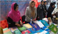 WHO stand displaying numerous publications on reproductive, maternal, newborn and child health in Dari, Pashto and English