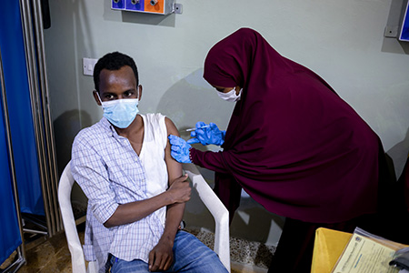 Alongside the government and partners, WHO supports COVID-19 vaccinations for eligible people. Photo credit: WHO Somalia