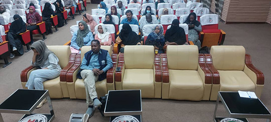 Members of the audience look on as Dr Abid opens a case management training session in Gedaref, accompanied by state health officials. Photo credit: WHO Sudan