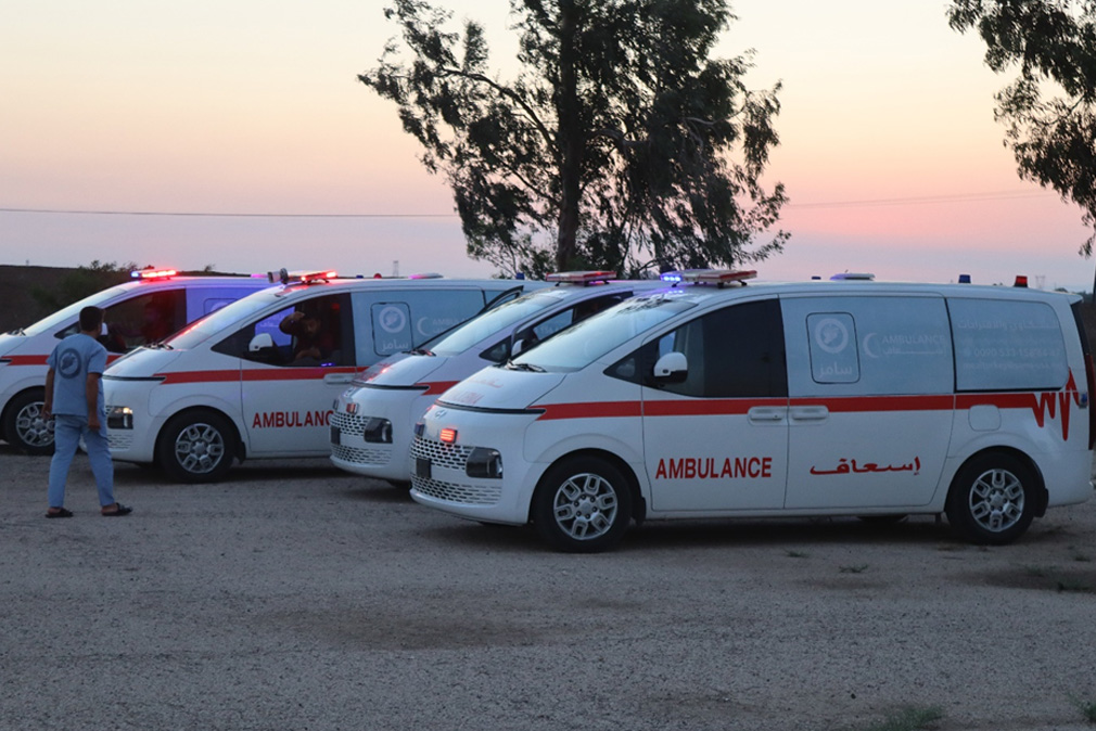 Ambulances supported by WHO and managed by SAMS prepare to transfer patients with war-related injuries in Sweida. Photo credit: WHO