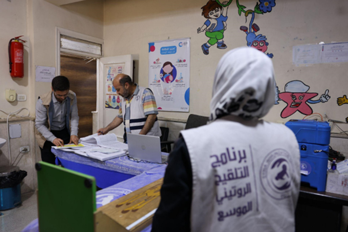 Health workers at a vaccination centre in Idlib prepare for the day’s immunization efforts. Photo: WHO