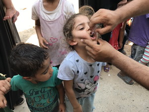 Children being vaccinated against polio