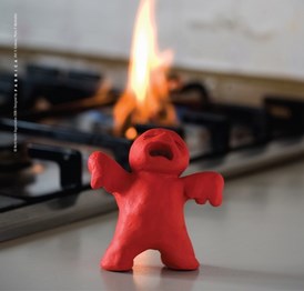 plasticine doll on fire