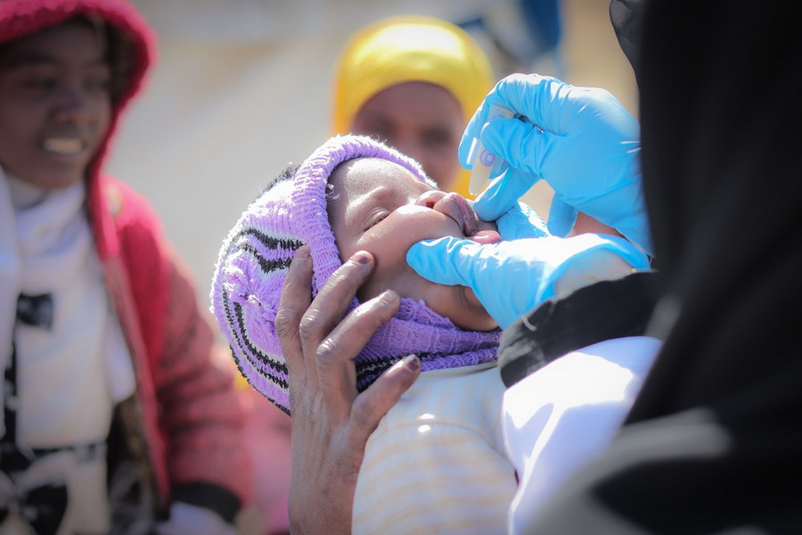 A child receives an oral cholera vaccine during the campaign. Photo: WHO