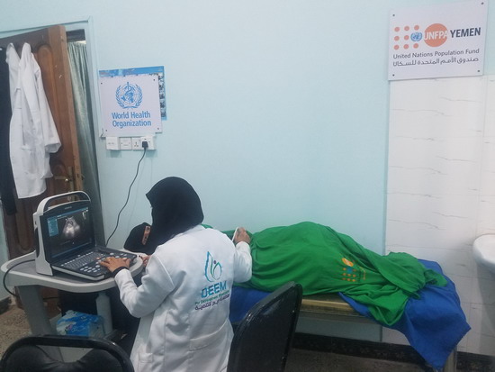 health-worker-performing-ultrasound-al-wadhah-health-centre-Taiz