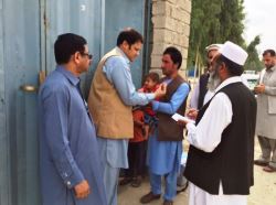 Polio vaccination team makes house-to-house calls in Laghman province to check that all children have been immunized