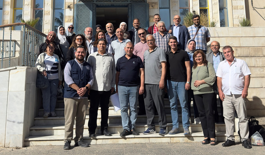 Participants of the training during a field visit to Al-Zahera Al-Jadeeda Comprehensive Health Care Centre in Damascus to practice assessing WASH FIT indicators. Photo credit: WHO/CEHA