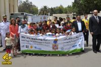 Children, parents, teachers and government officials take part in a march organised by the nongovernmental organization Egyptian Society for Road Safety to raise the public's awareness of road safety