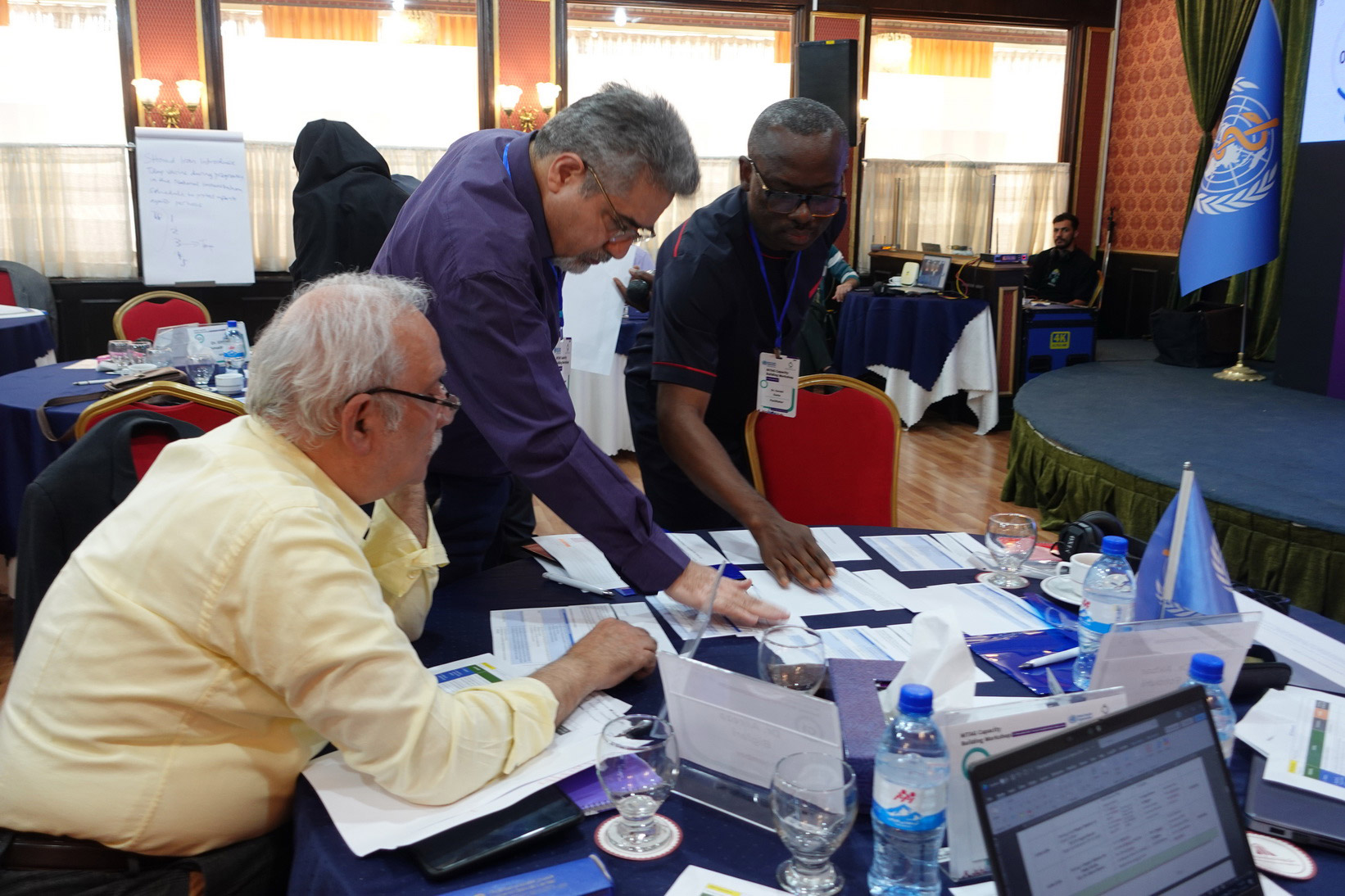 Reviewing data and present evidence-based cases with guidance from WHO EMRO experts, reinforcing independent, science-driven recommendations for vaccine introduction and routine immunization across the life course. Photo credit WHO Iran