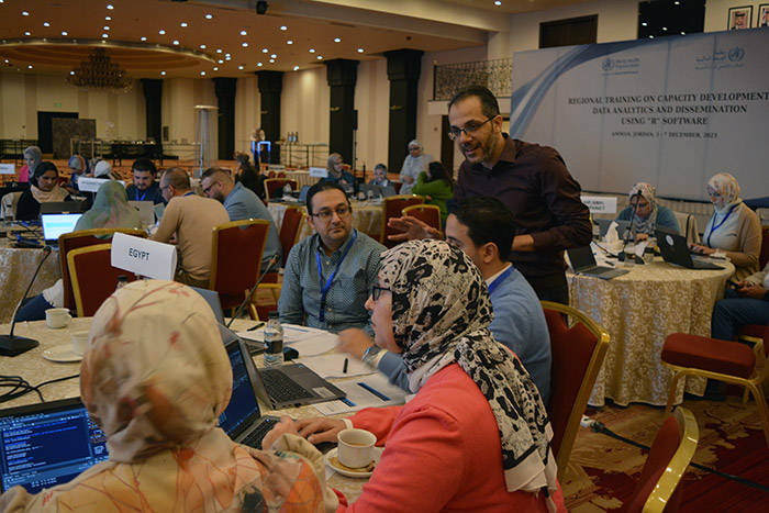 Participants listen to a WHO expert during the training. Photo credit: WHO/Health Emergency Information and Risk Assessment Unit