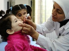 Syrian kid being vaccinated against polio