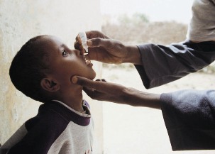 Child being immunized against polio in South Sudan