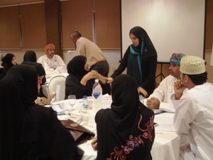 Facilitators assist the participants during the course