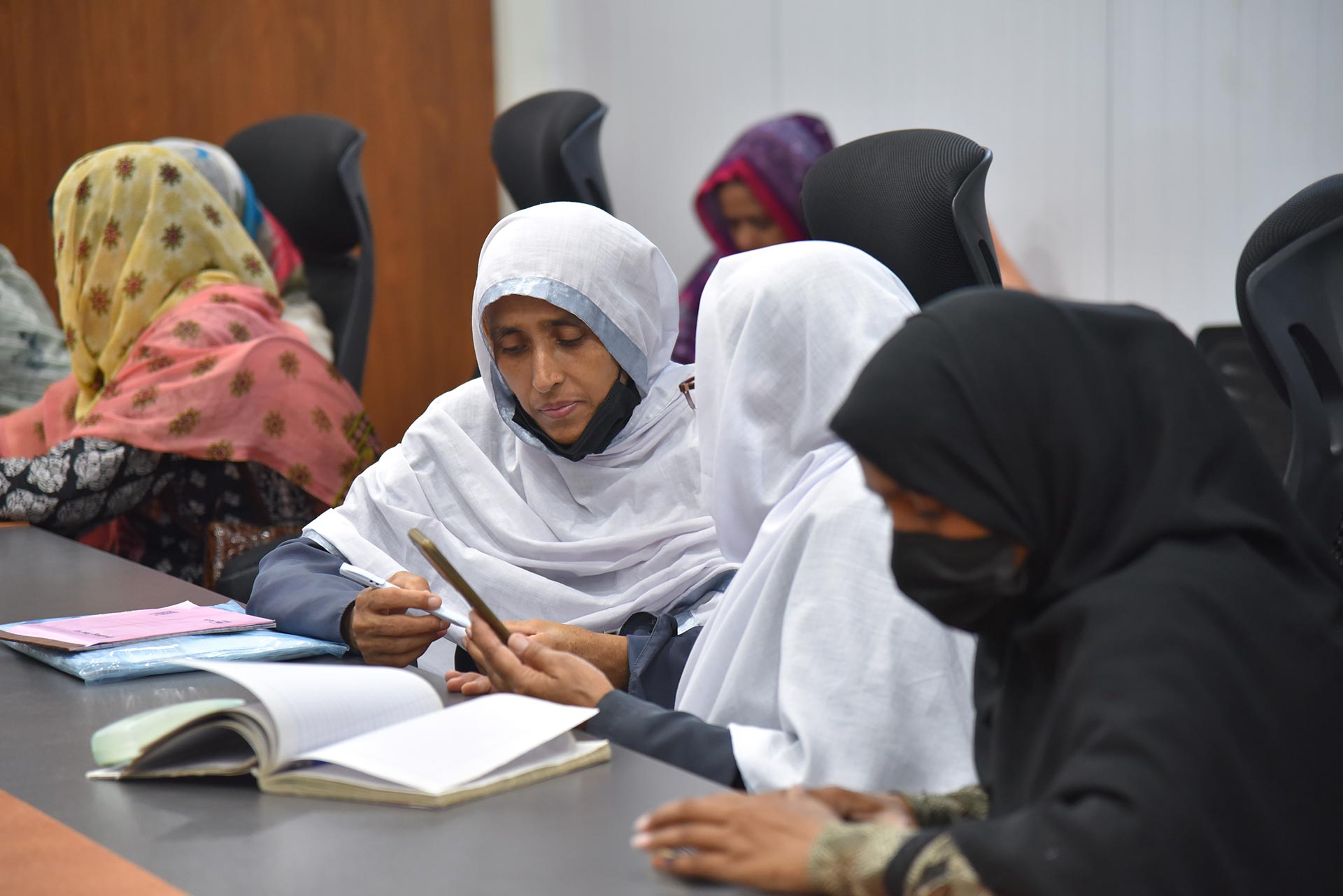 Health workers Naheed and Shaheen during a training facilitated by WHO Pakistan. Photo credit: Hamid Inam/WHO Pakistan.