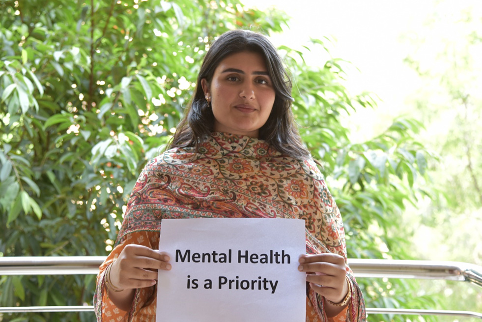 Sejal, a psychology student at NUST University, supports mental health awareness efforts in Pakistan. Photo credit: Sara Akmal/WHO Pakistan
