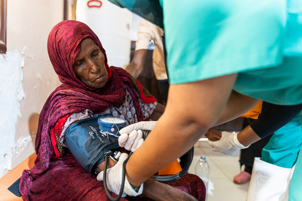 A patient receives care at the cholera treatment centre, Gadarif, in October 2023. The centre admits 46 cases a day on average and has a laboratory and pharmacy to support its operations. Photo credit: WHO/A. Kheir