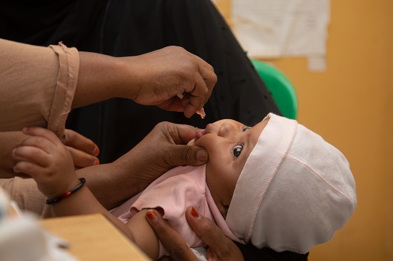 infant-receives-polio-drops-1