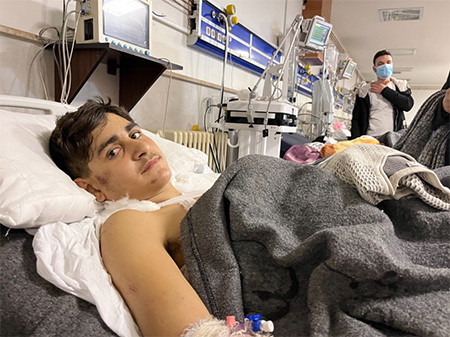 14-year Ahmad, receiving trauma services at a WHO-supported hospital in Aleppo.