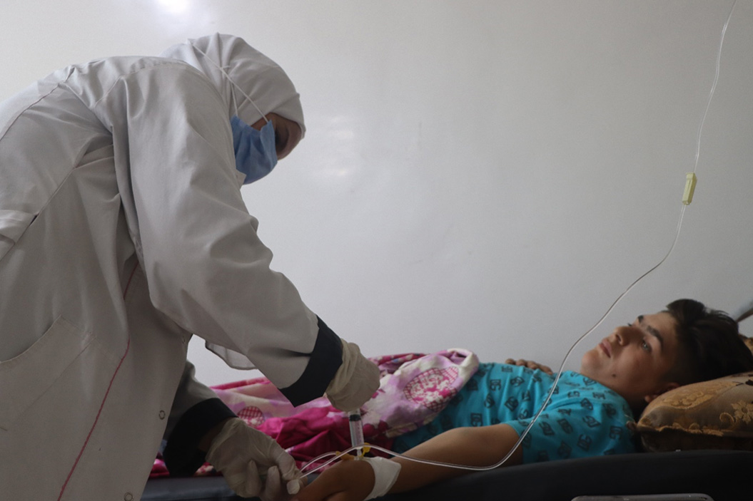 Abdelhadi-Mousa-receives-post-operative-care-at-Menbij-National-Hospital-after-undergoing-gallbladder-surgery.jpg