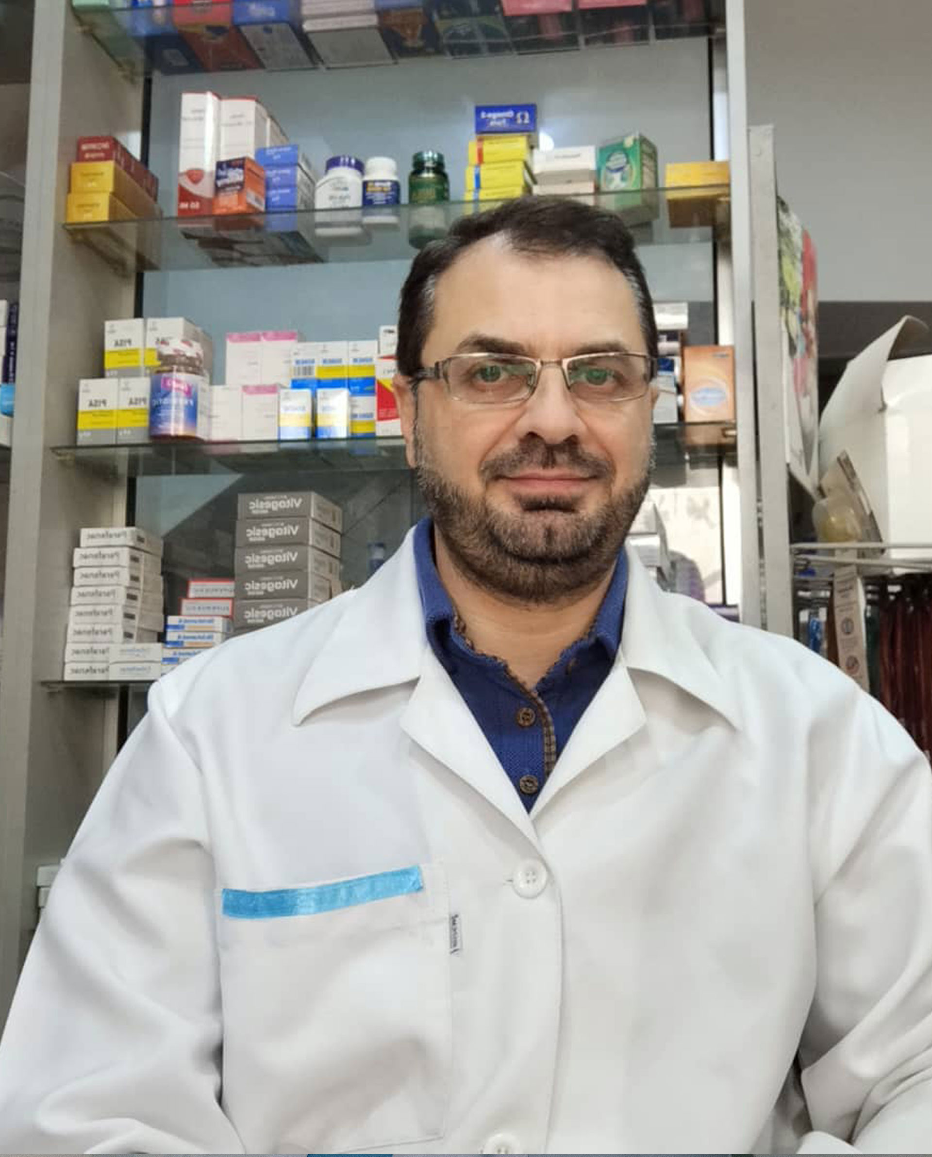 Dr Kamal Al-Dallal at his pharmacy in Hama tells of his experience with people who request antibiotics without prescriptions . Photo credit: WHO 