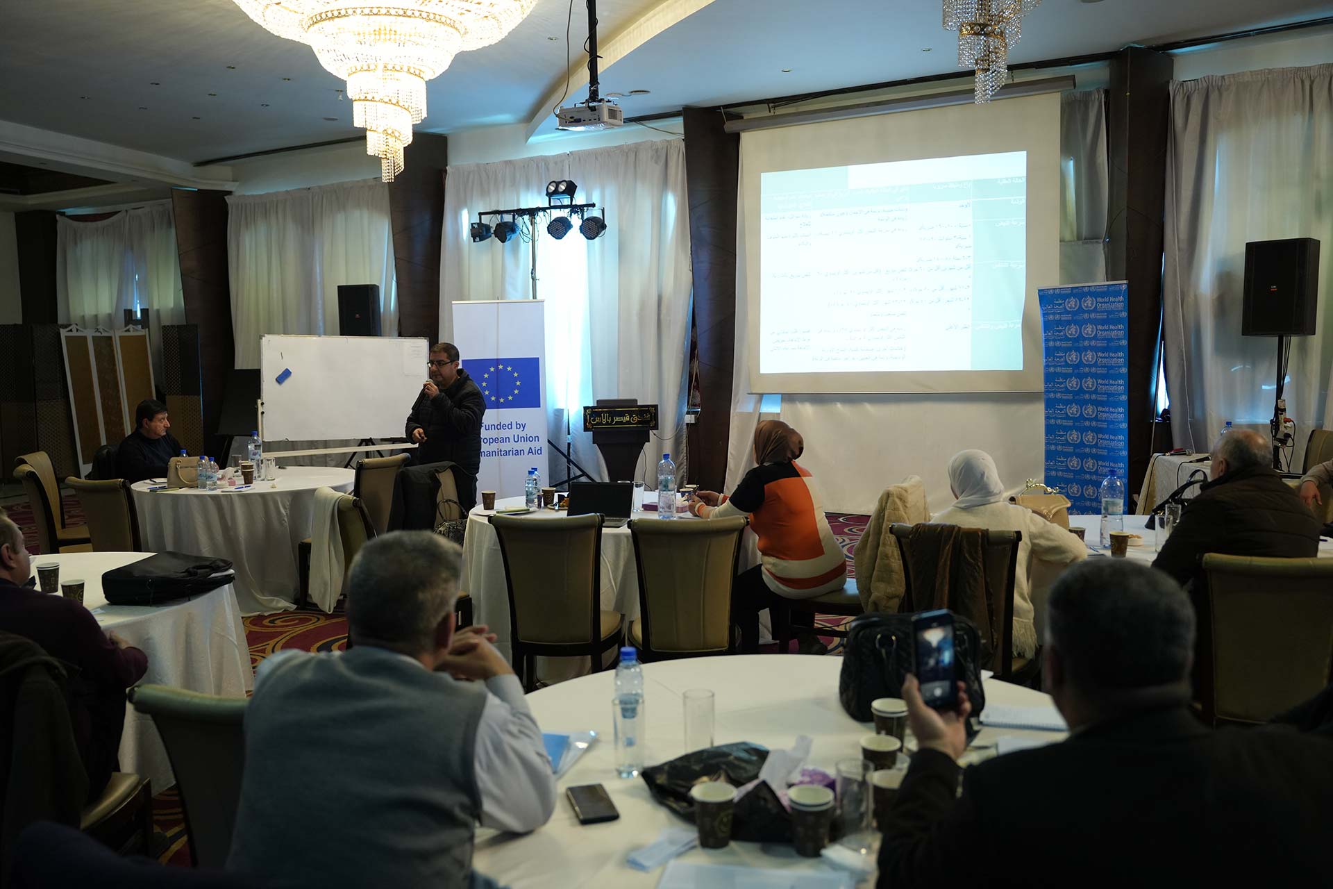 Participants engage with the trainer at one of the sessions. Photo credit: WHO