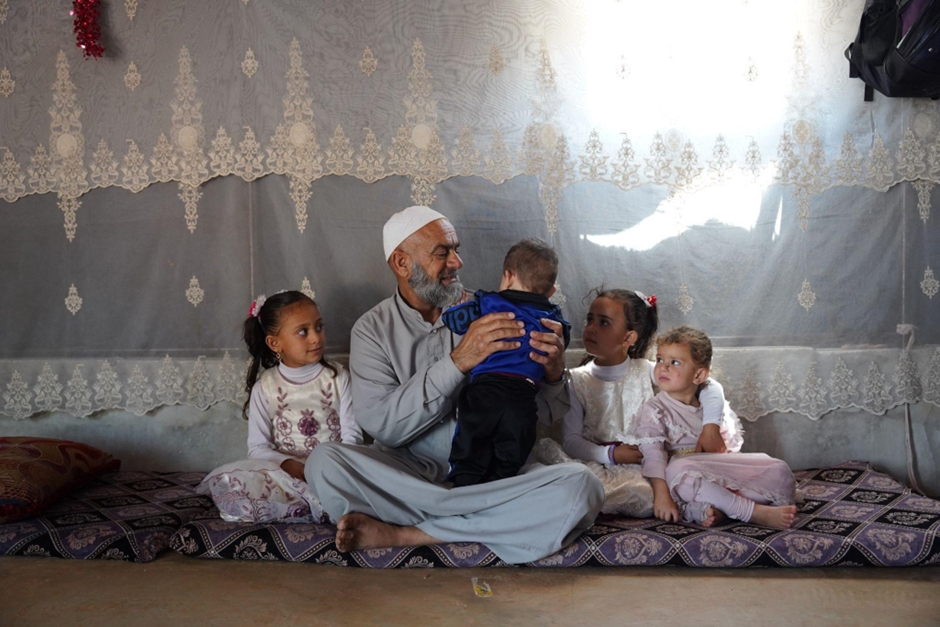 A grandfather’s quiet routine inspires confidence in vaccination in Syria
