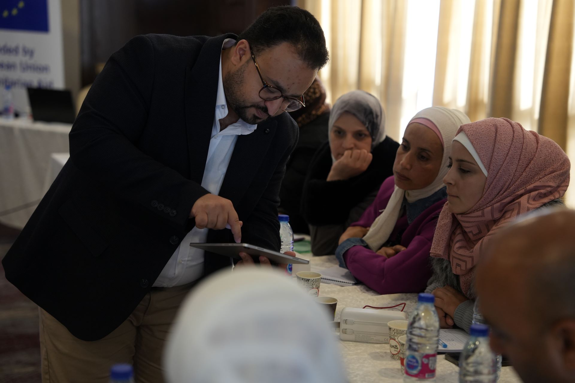 Khaled Najjar, Information Officer for Nutrition Sector at Save the Children, guides participants on accurate data collection and entry during the training. Photo credit: WHO