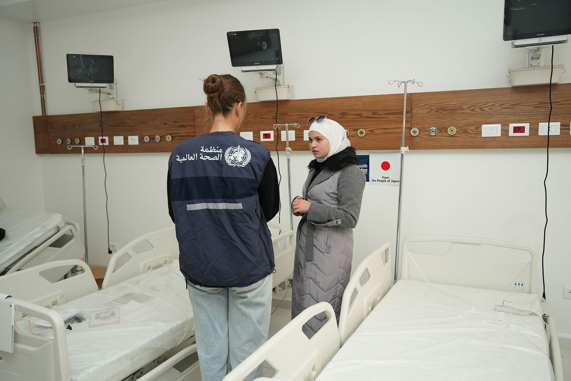  The engineering team inside the newly rehabilitated inpatient ward, equipped and prepared for future patient services. Photo credit: WHO