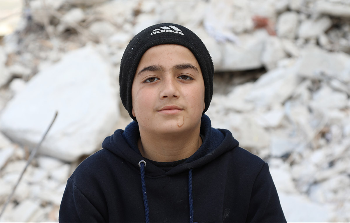 Thirteen-year-old Ahmad was asleep at home in Azmarin, a small village in north-west Syria, when the house began to shake violently in the middle of the night. The deadly earthquakes of 6 February 2023 had begun.