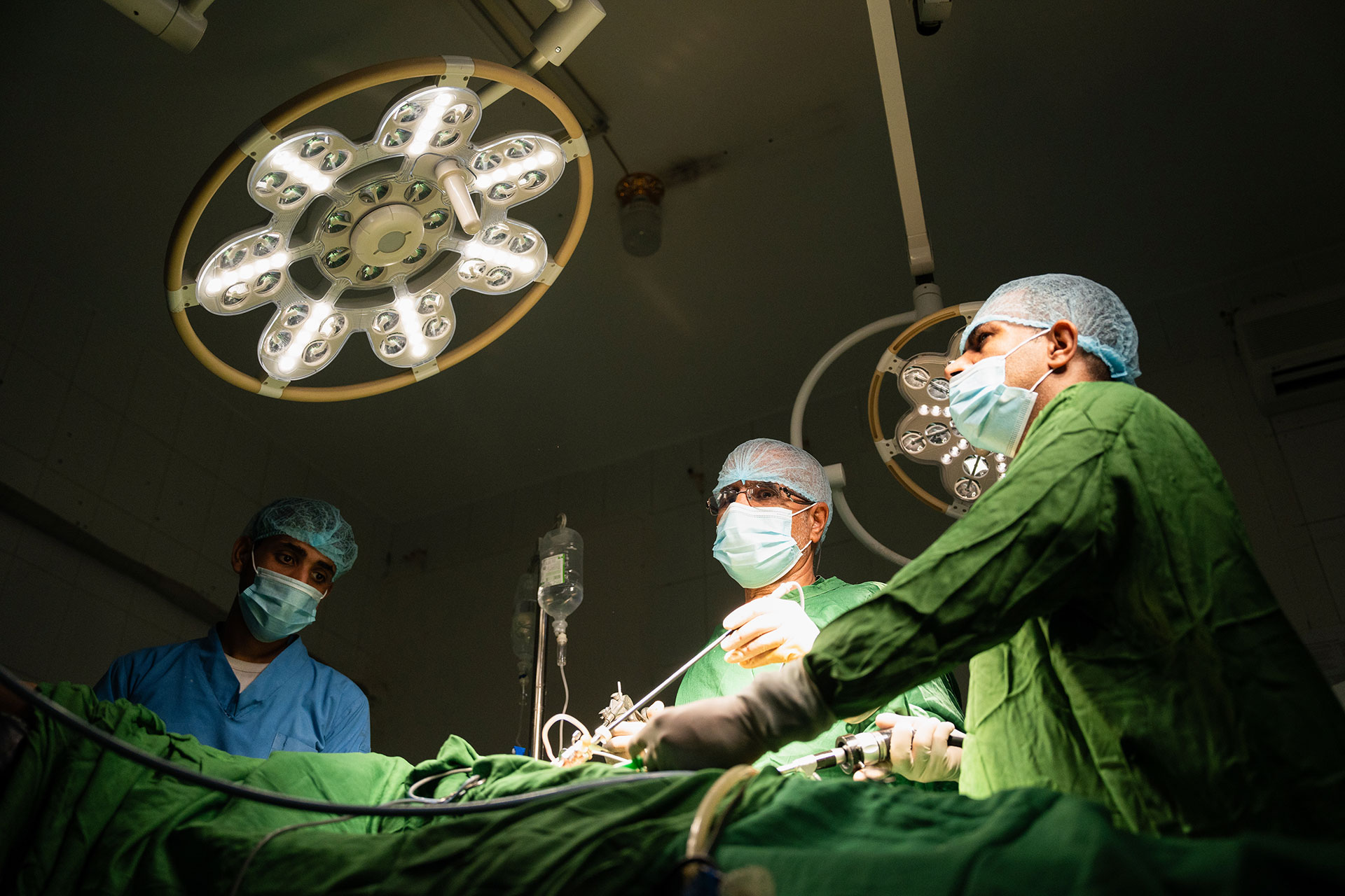 Doctors perform an endoscopy procedure on a patient, carefully examining the internal organs. They work together to ensure the procedure is safe, while monitoring the patient’s condition throughout.