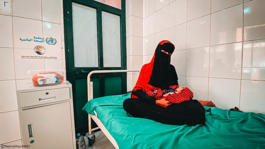 Mrs.Yassmin with her malnourished daughter Arhaf at Al- Sadaqah Hospital in Aden. The hospital is supported by WHO and KSrelief. Photo: WHO/Nesma Khan